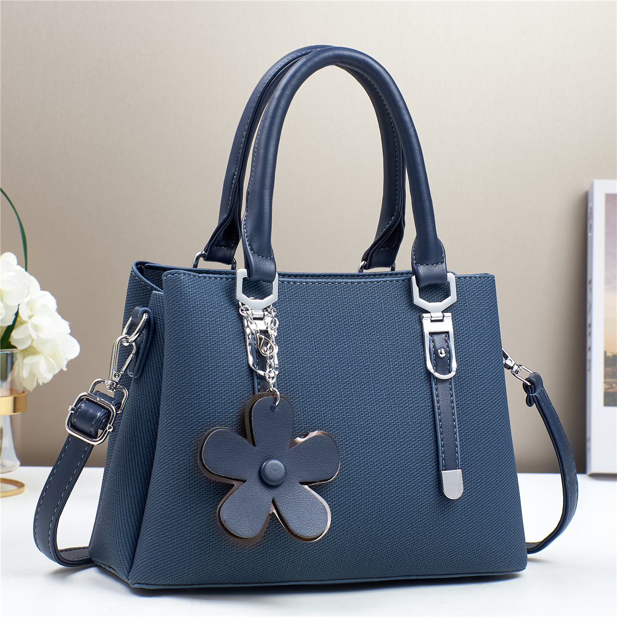 Womens Fashionable Textured Handbag with Flower Charm